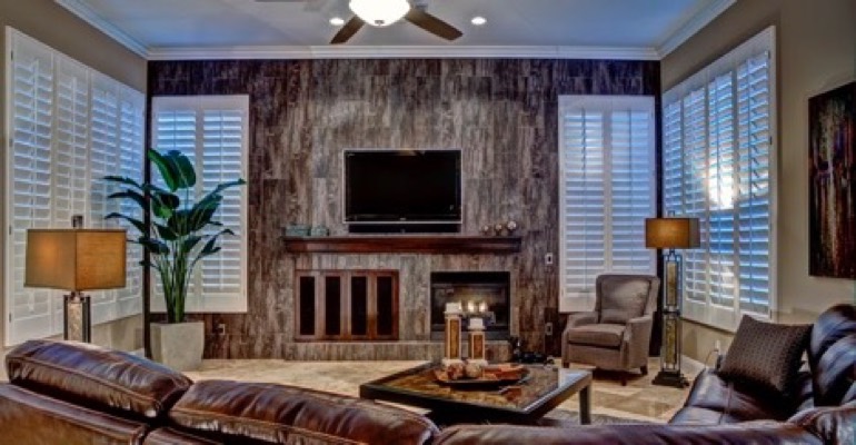 A living room filled with furniture and a fireplace